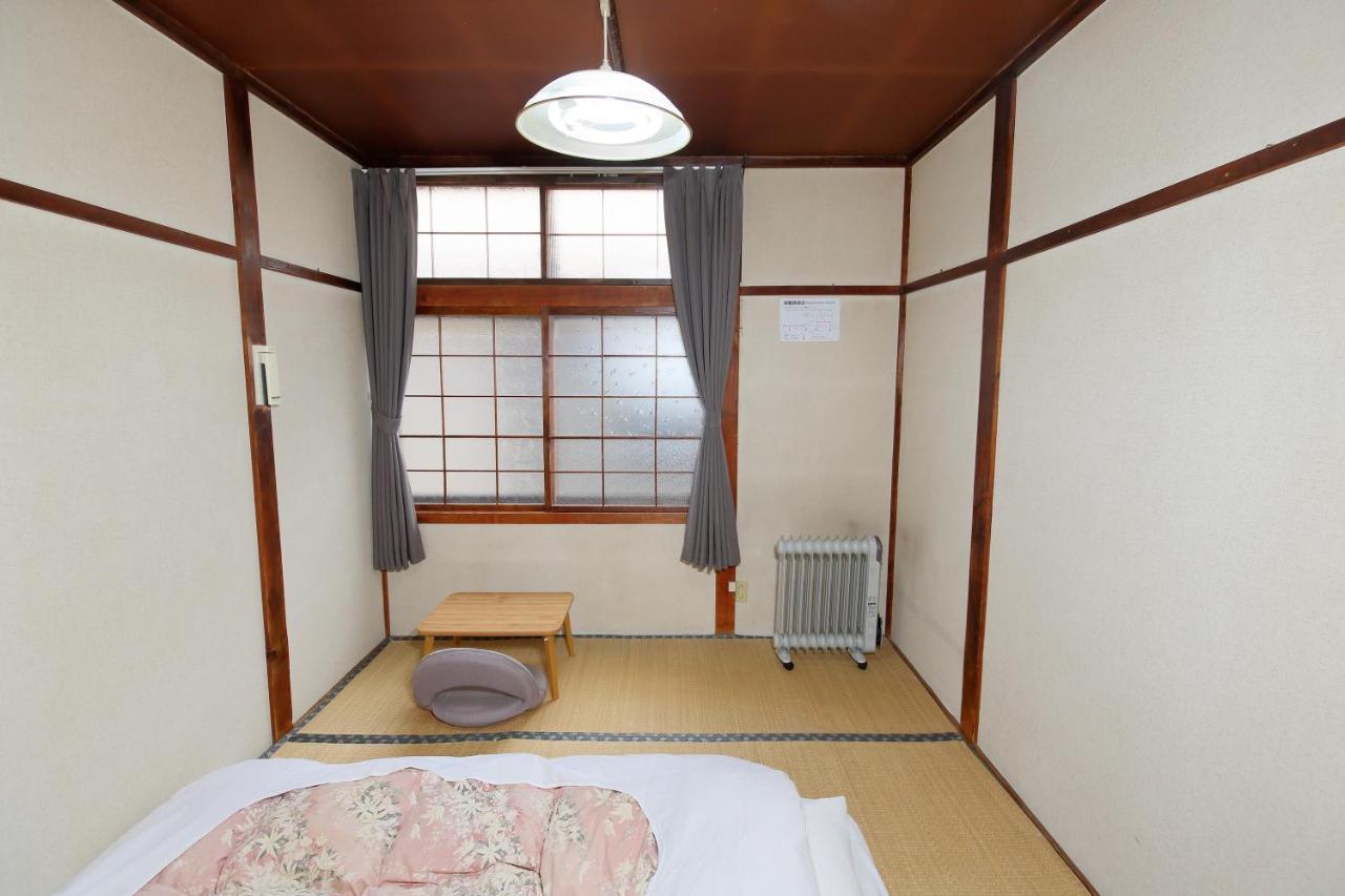 Guest House Shikotsu Kamui Chitose  Bagian luar foto