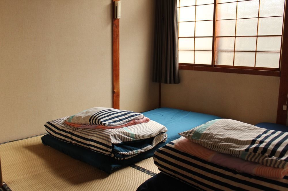 Guest House Shikotsu Kamui Chitose  Bagian luar foto